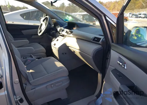 2016 Honda Odyssey Lx z USA, uszkodzony, nr VIN 5FNRL5H2XGB129117